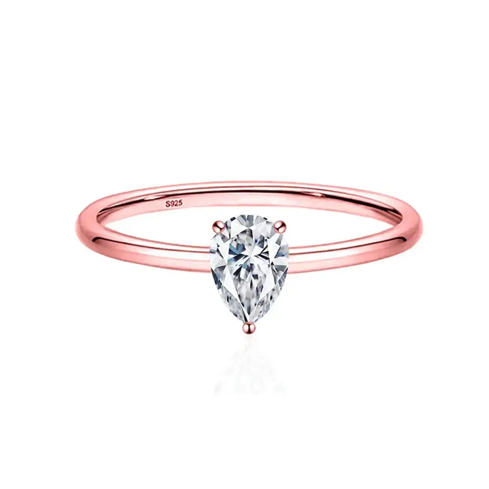 Rose gold engagement ring with pear-shaped moissanite diamond in sterling silver