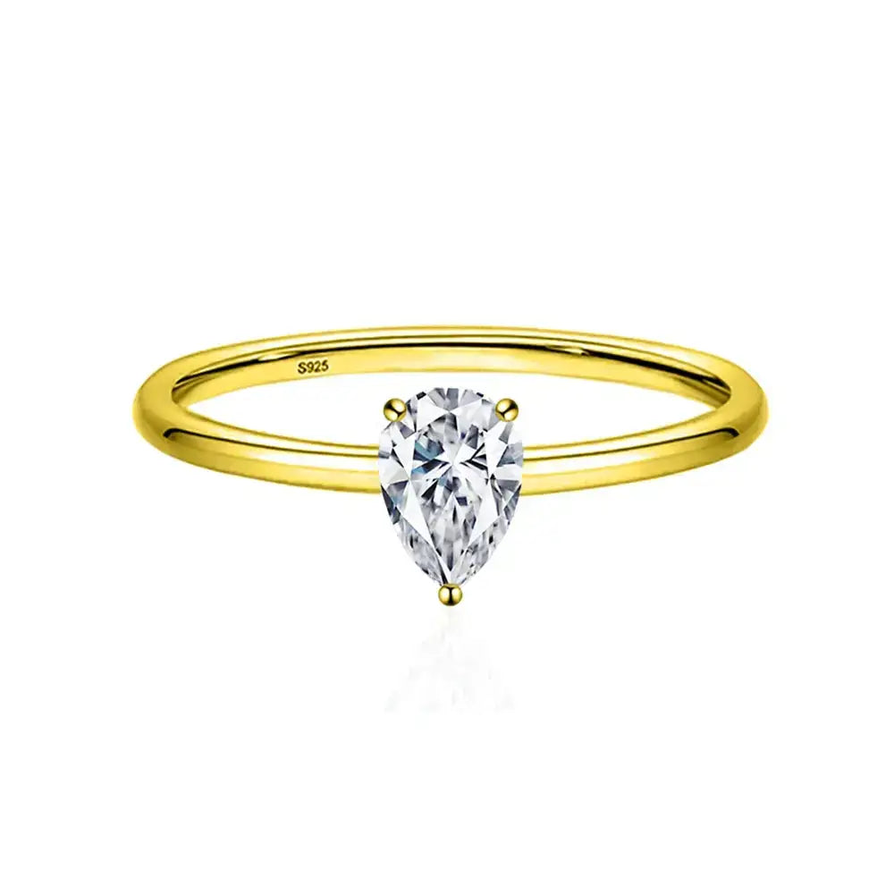 Gold ring featuring a pear-shaped Moissanite diamond in sterling silver, elegant anniversary gift