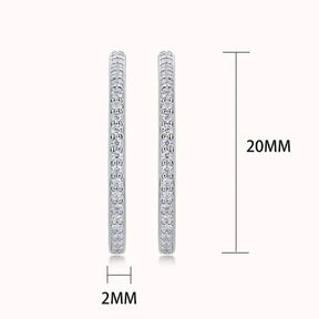 Thin circular diamond hoop earrings displayed with measurements, featuring sterling silver 20mm design