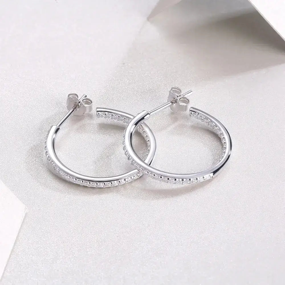 Pair of sterling silver 20mm Moissanite diamond hoop earrings with crystal accents