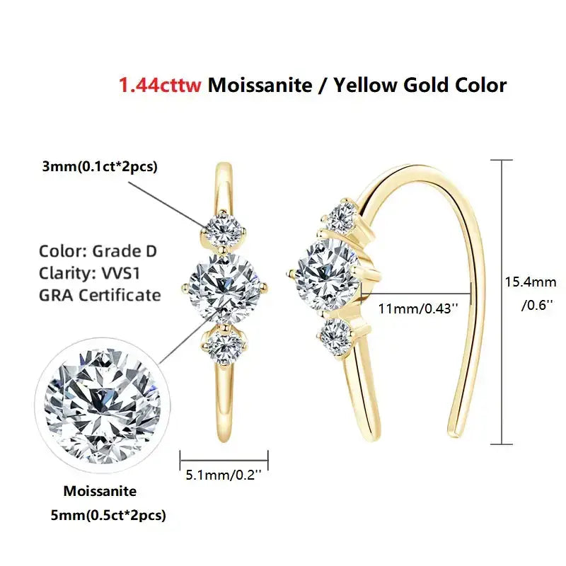 Yellow gold ring with three moissanite stones, complementing U Shaped Moissanite Earrings