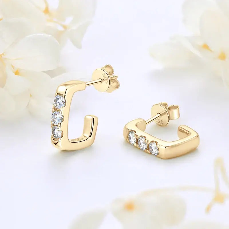 Gold earrings with diamond accents in a rectangular hoop design, versatile C shape open earrings